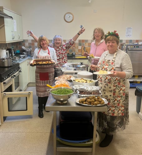 Ashrington volunteers deliver a military operation to host 35 for Christmas Lunch.